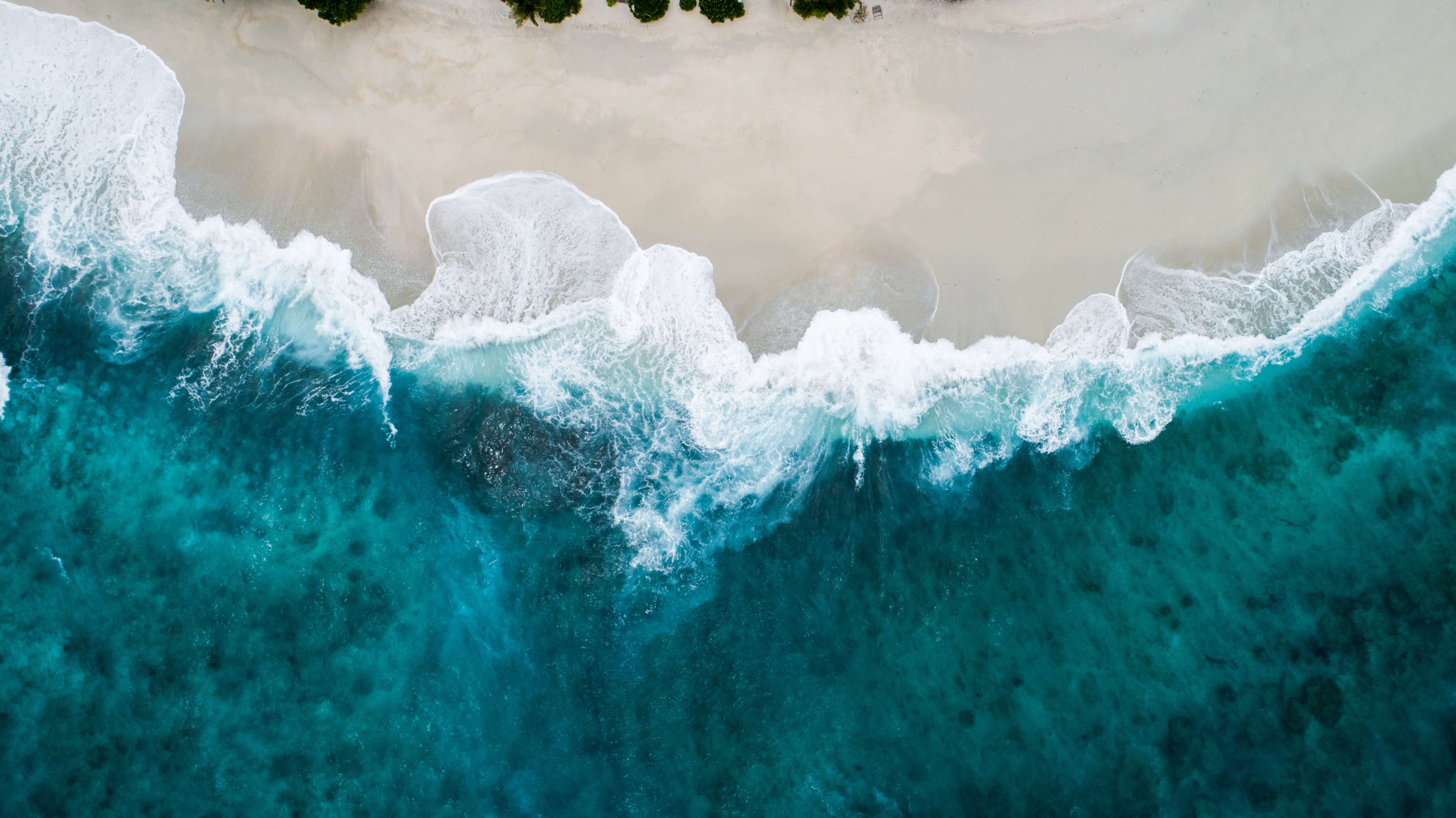 Waves breaking on a perfect shore.